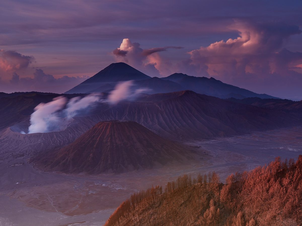 Sunrise over the smoking caldera of Mount Bromo, East Java