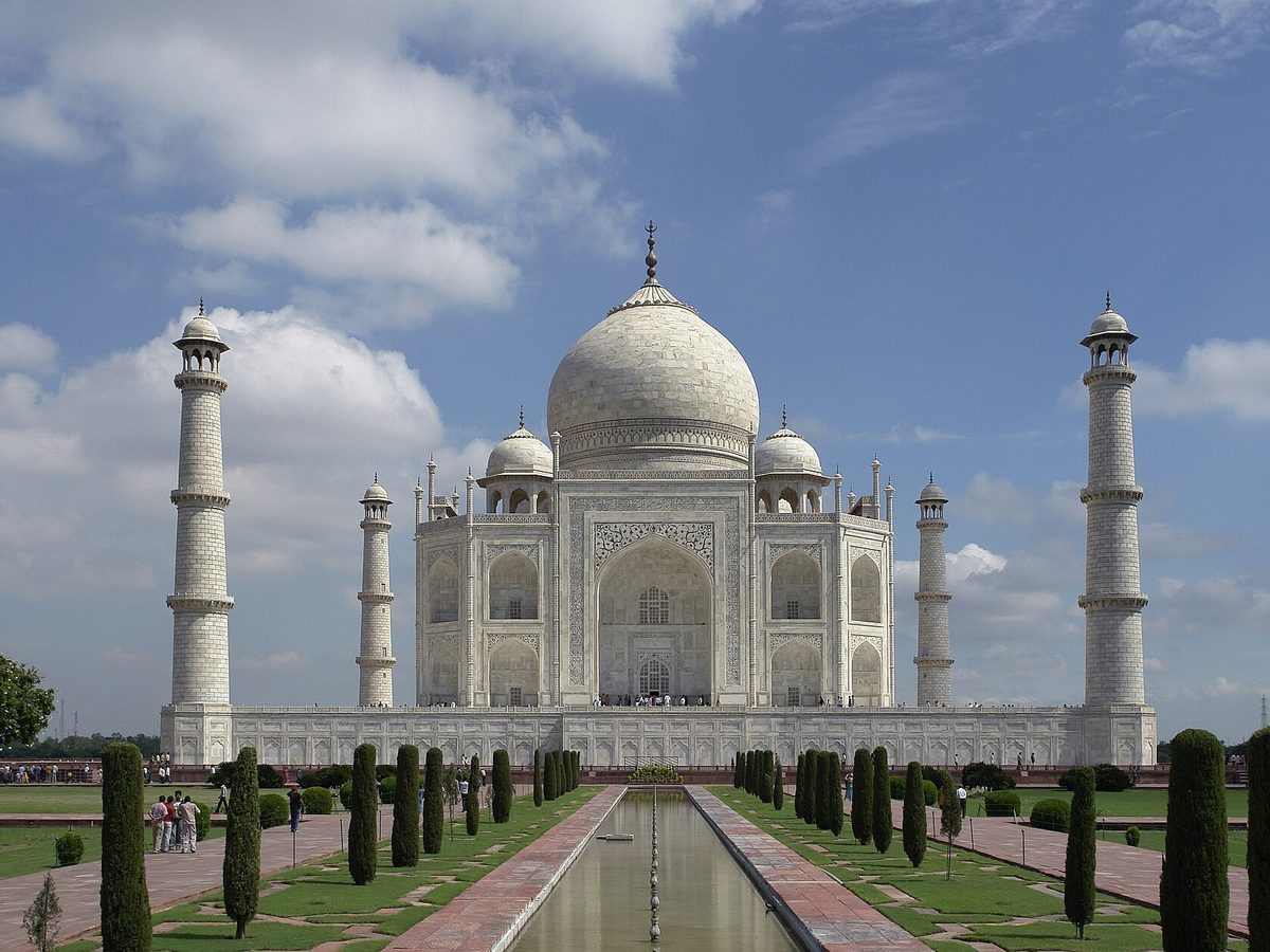 The Taj Mahal reflected in its garden pool at Agra